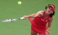 radwanska advances in rainy malaysian open tennis