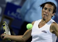 Former French Open winner Francesca Schiavone, pictured in February 2012, has joined the growing list of players forced to pull out of the Indian Wells tennis tournament complaining of a virus. (AFP Photo/Marwan Naamani)