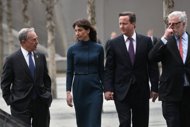 British Prime Minister David Cameron (2ndR) and his wife Samantha Cameron (2ndL) walk with New York City Mayor Michael Bloomberg (L) and Patrick Foye, executive director of the Port Authority of New York and New Jersey during a visit to the World Trade Center Memorial in New York, New York