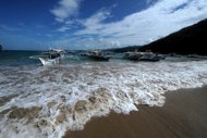 Illustration photo shows a beach on the Philippine island of Palawan. A luxury cruise ship with about 600 mostly American and European tourists was adrift in Philippine waters Saturday after an engine room fire that injured five crew, the coast guard and the liner said