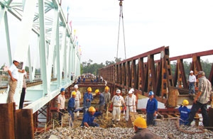 Japanese ODA putting railway bridge reinforcement on track
