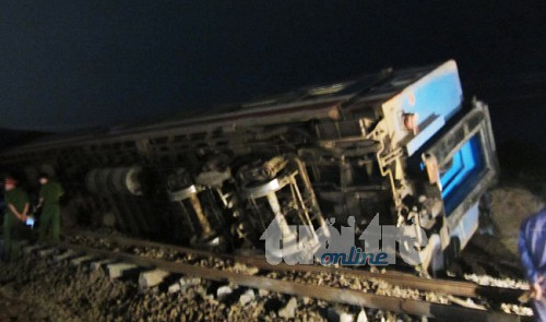 train hits truck throwing three carriages off railway killing engine driver in vietnam