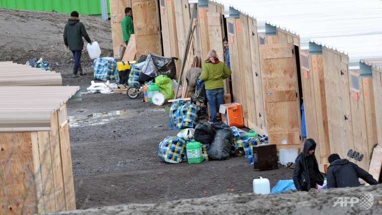 new refugee camp opens in northern france as calais residents protest