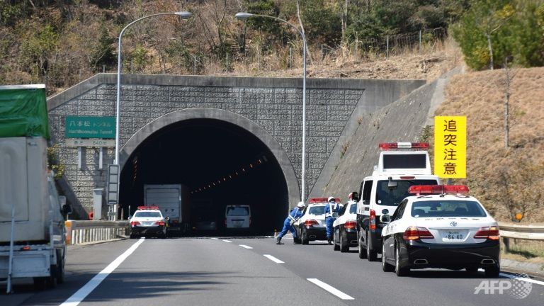 japan highway tunnel pile up kills two sends dozens to hospital