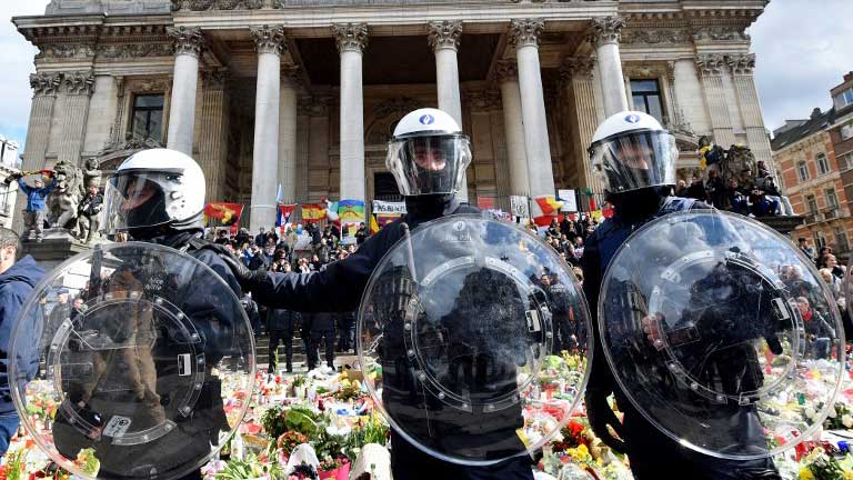 brussels police clash with far right mob at attacks shrine