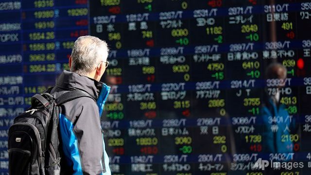 Asia markets down as energy firms hit by oil rout, dollar rises