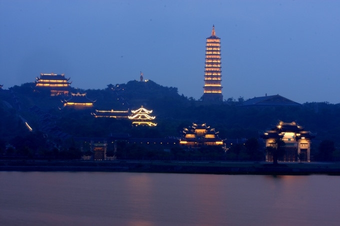 the quiet night glow of bai dinh pagoda photo