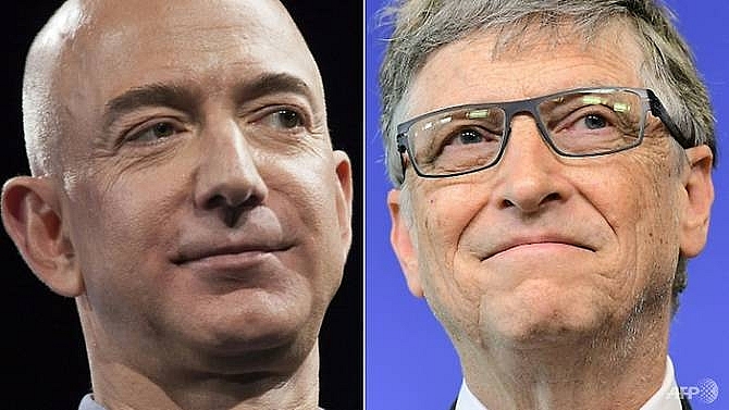 amazon chief jeff bezos tops forbes worlds rich bill gates drops to second