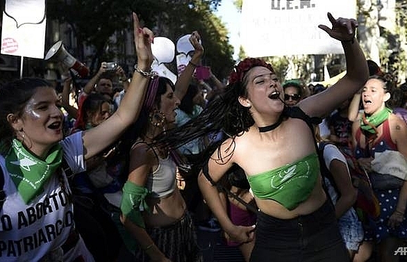 Women's Day marches fill Latin America capitals to denounce femicide