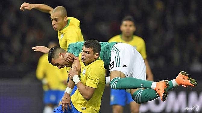 world cup hopefuls spain crush argentina brazil edge germany