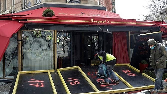 paris luxury stores looted burned in yellow vest riots