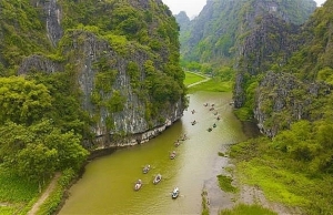 Tam Coc-Bich Dong blanketed with green rice fields