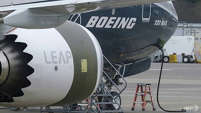 boeing holds test flights for 737 max after crashes