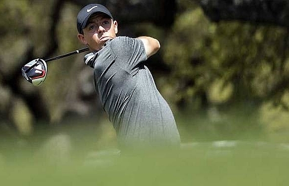 McIlroy wins, Tiger falls, Day ousted at WGC-Match Play