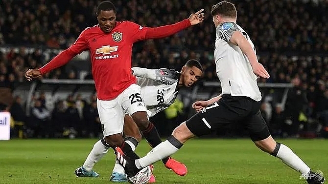 ighalos double denies rooney as man utd move into fa cup quarter finals
