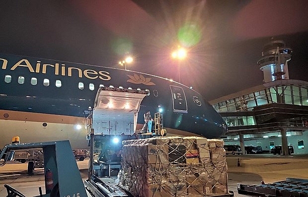 vietnam airlines carries anti covid 19 equipment to hanoi for free