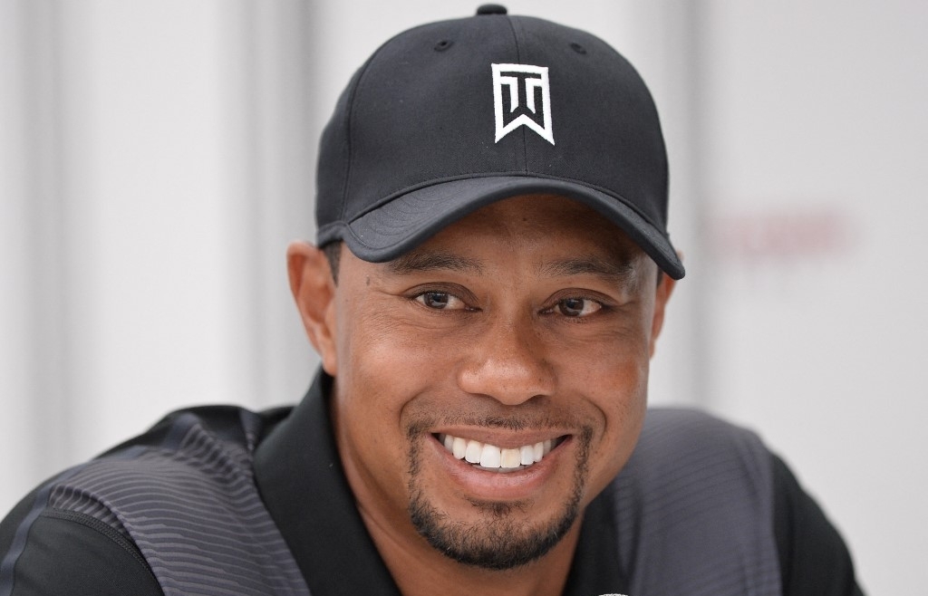 Tiger Woods says recovering at home after crash