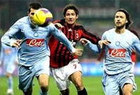 Napoli beat Bologna to hang onto Milan coat-tails
