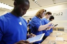 apple nearly doubles net profit ipad sales dip