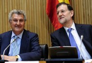 Spain's Prime Minister Mariano Rajoy (R) sits next to the president of the Spanish paliament Jesus Posada (L) during a meeting at the Parliament in Madrid. Spain urged its EU peers to be 