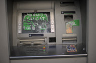 A defaced ATM is seen in March, one day after a general strike in Spain. The International Monetary Fund Wednesday urged Spain to push further ahead with banking reforms aimed at stabilising its troubled financial sector.