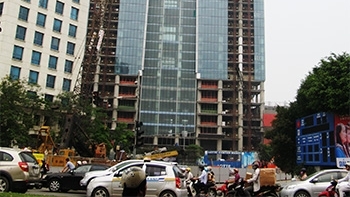 lottes ao dai tower rises higher in hanoi