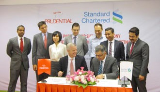 Prudential Vietnam and Standard Chartered Vietnam sign partnership agreement