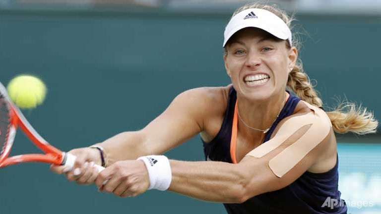 kerber outlasts keys for charleston wta title