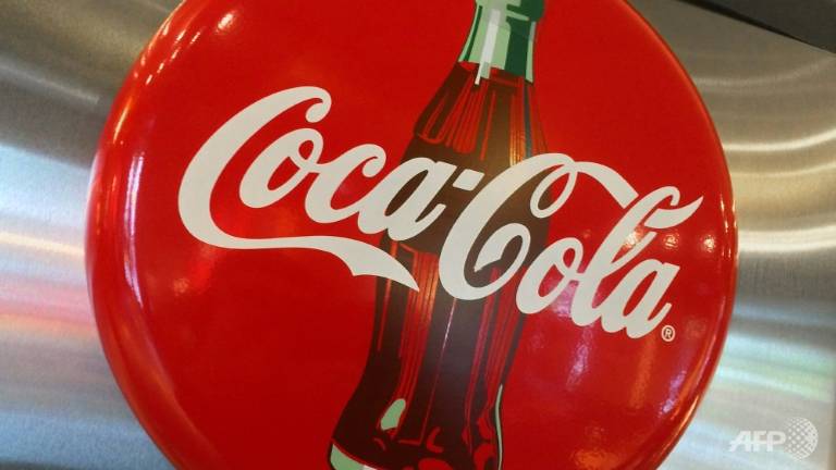 Coca-Cola to cut 1,200 jobs as earnings fall