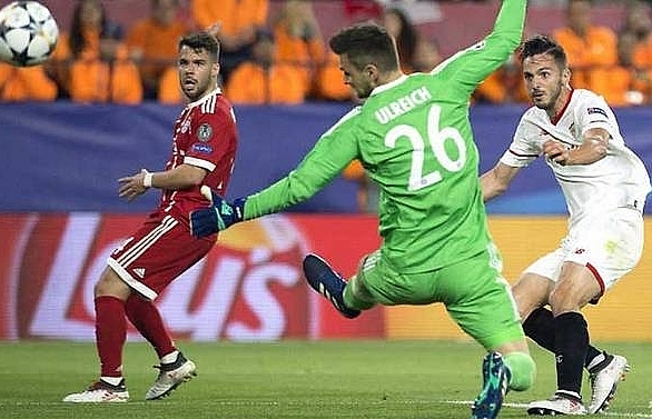 Thiago grabs winner as Bayern come back to beat Sevilla