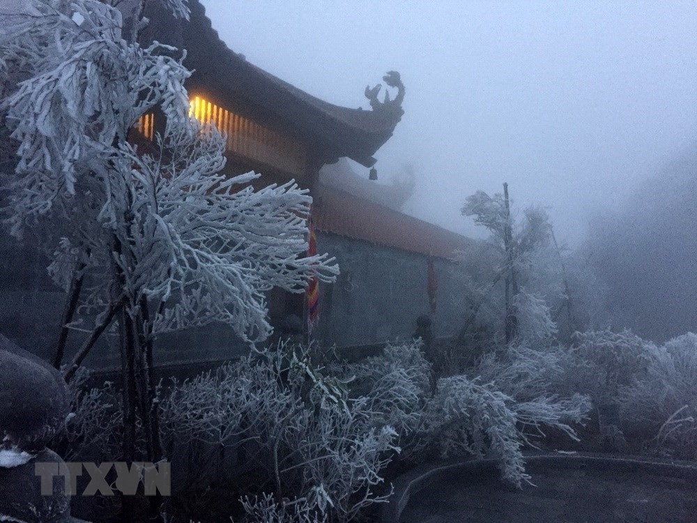 mount fansifan covered with ice as cold spell strikes vietnams northern region