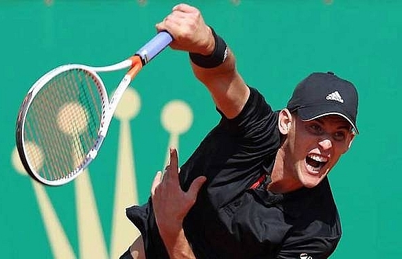 Thiem saves match point in victory over Rublev