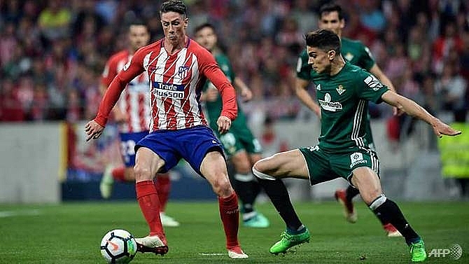 atletico draw to leave barcelona even closer to title