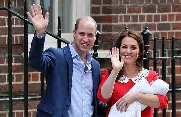 Britain's Prince William and Kate return home with newborn son
