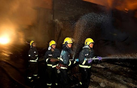 At least 18 dead in China karaoke lounge fire, arson suspected