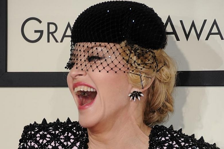 madonna loses bid to stop auction of intimate items