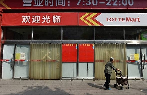 South Korea's Lotte to sell some China stores after missile row