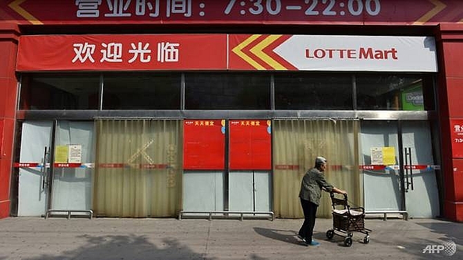 south koreas lotte to sell some china stores after missile row