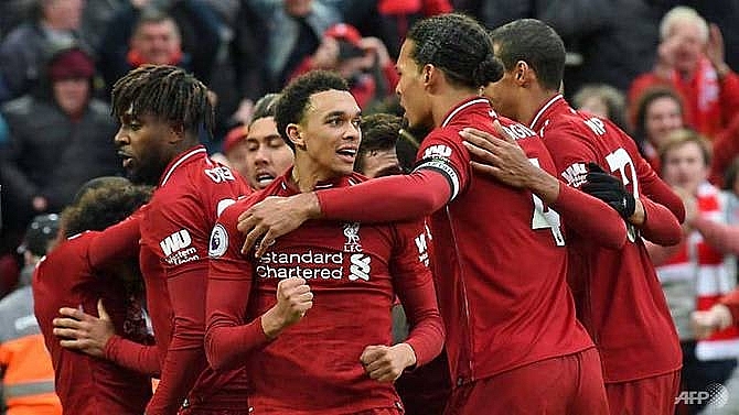 liverpool back on top as late own goal secures 2 1 win over tottenham