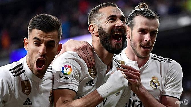 benzema saves real madrid blushes with late huesca winner