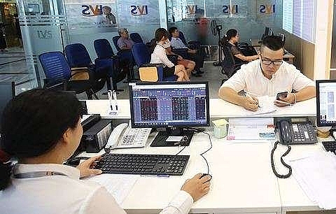 vietnam stocks inch up amid market caution