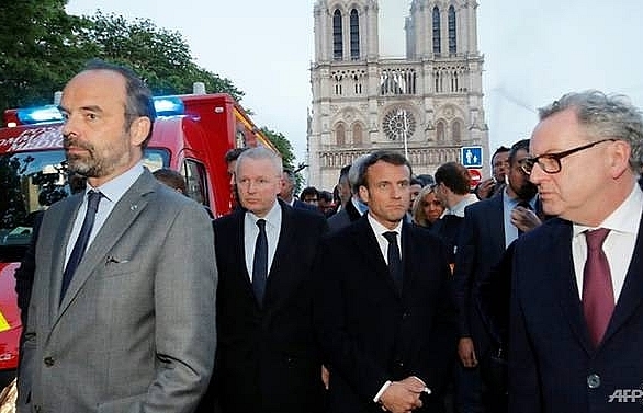 'We will rebuild Notre-Dame together', says France's Macron
