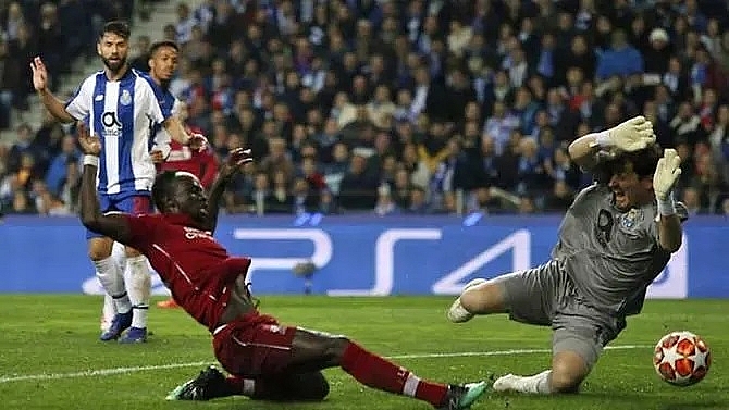 liverpool seal semi final date with barcelona after strolling past porto