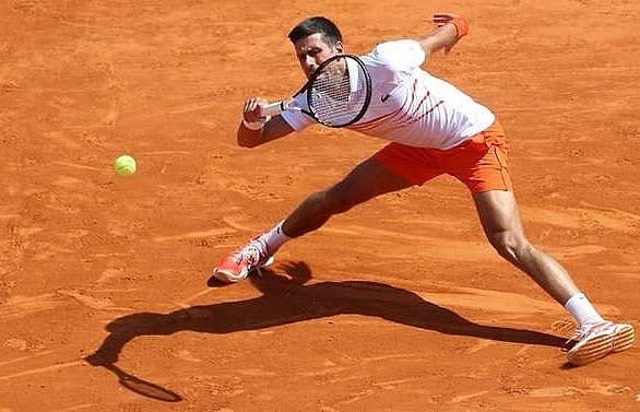 Djokovic knocked out as 'lucky' Nadal battles on in Monte Carlo