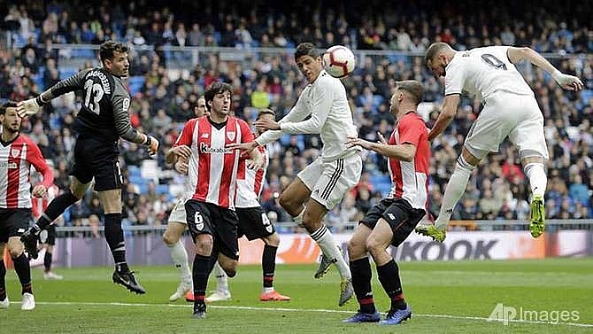 benzemas hat trick fires real madrid past bilbao