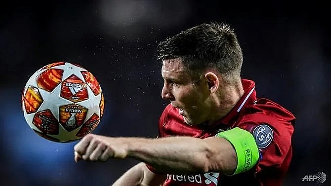 liverpools milner cheering on manchester united