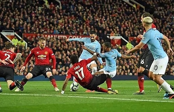 man city pile on misery for man utd to go back top