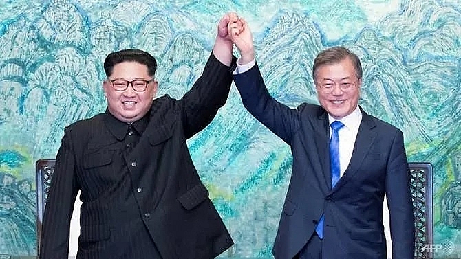 two koreas mark moon kim summit anniversary with different tones