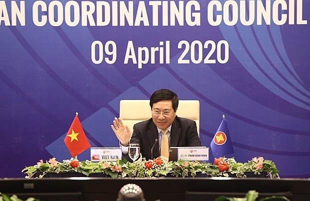 article of deputy prime minister foreign minister pham binh minh on aseans cooperation to combat covid 19