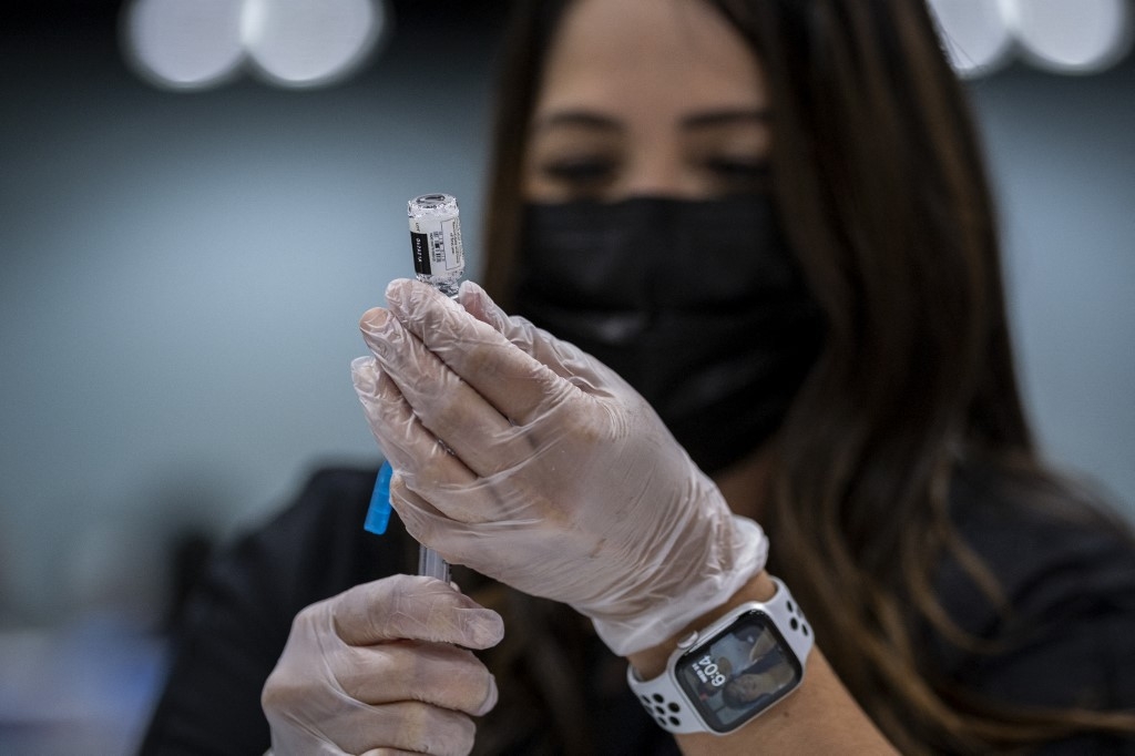 wto says 2021 global trade recovery rests on vaccines